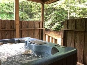 hot tub on deck of smoky mountain cabin