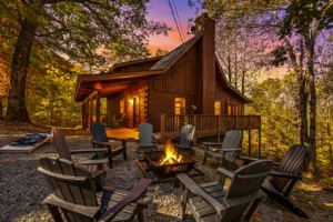 Rustic log cabin with fire pit and Adirondack chairs on patio in Sevierville, TN