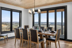 Modern dining room with valley views through floor-to-ceiling windows in Sevierville cabin