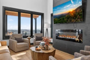 Modern luxury living room with mountain views and fireplace in Sevierville accommodation