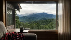 Spectacular view cabin in Sevierville TN showing Smoky Mountain ridgelines through the living room window